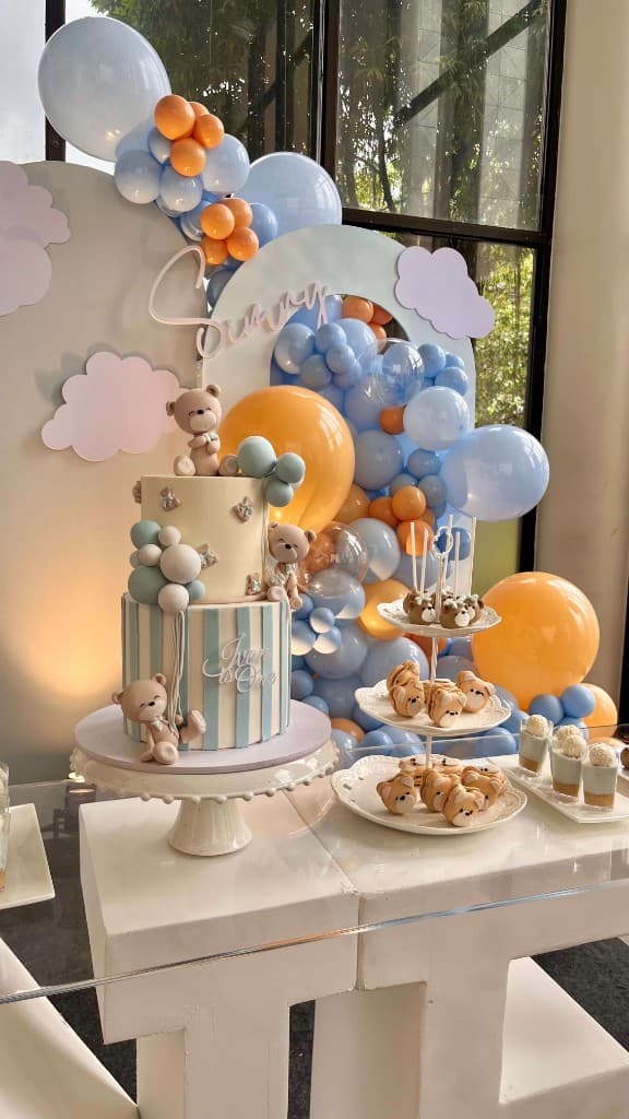 Blue and orange event dessert table