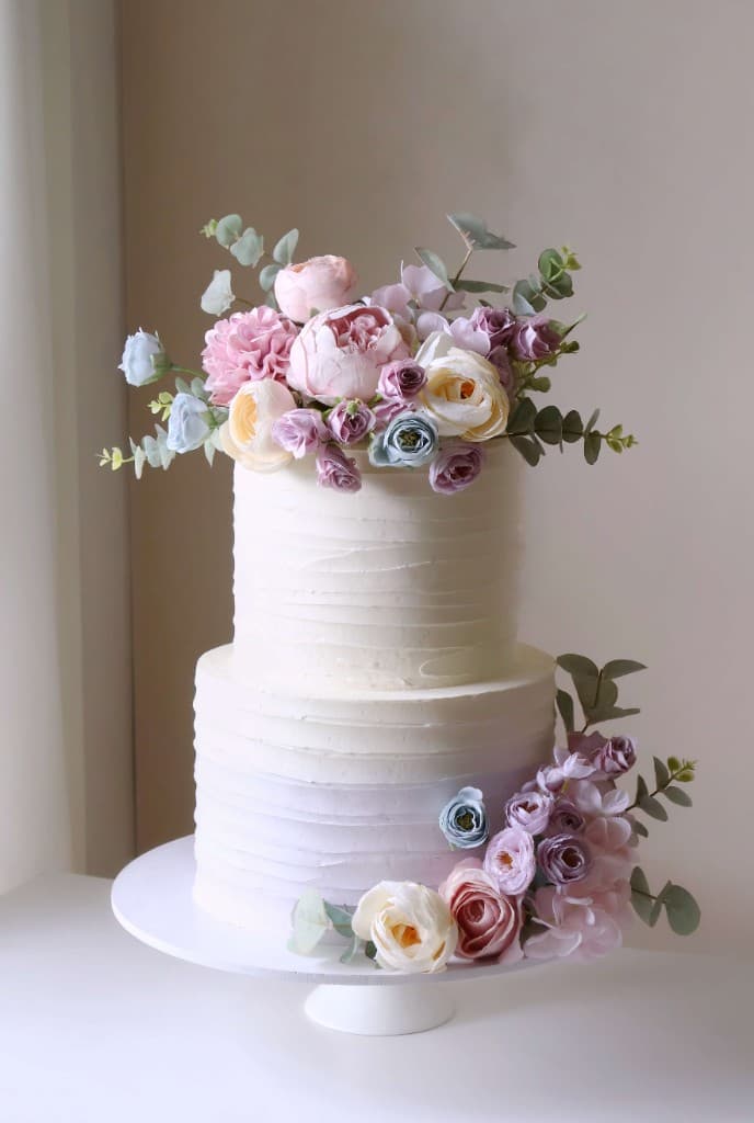 Two-tier floral wedding cake